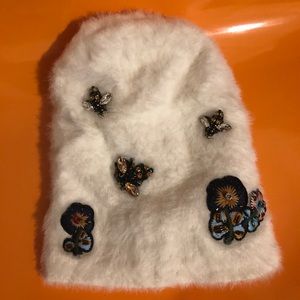 Anthropology sleeping on snow hat